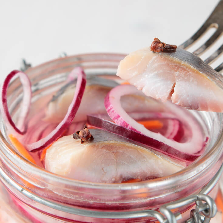 Background imagery related to pickled herring benefits and recipes